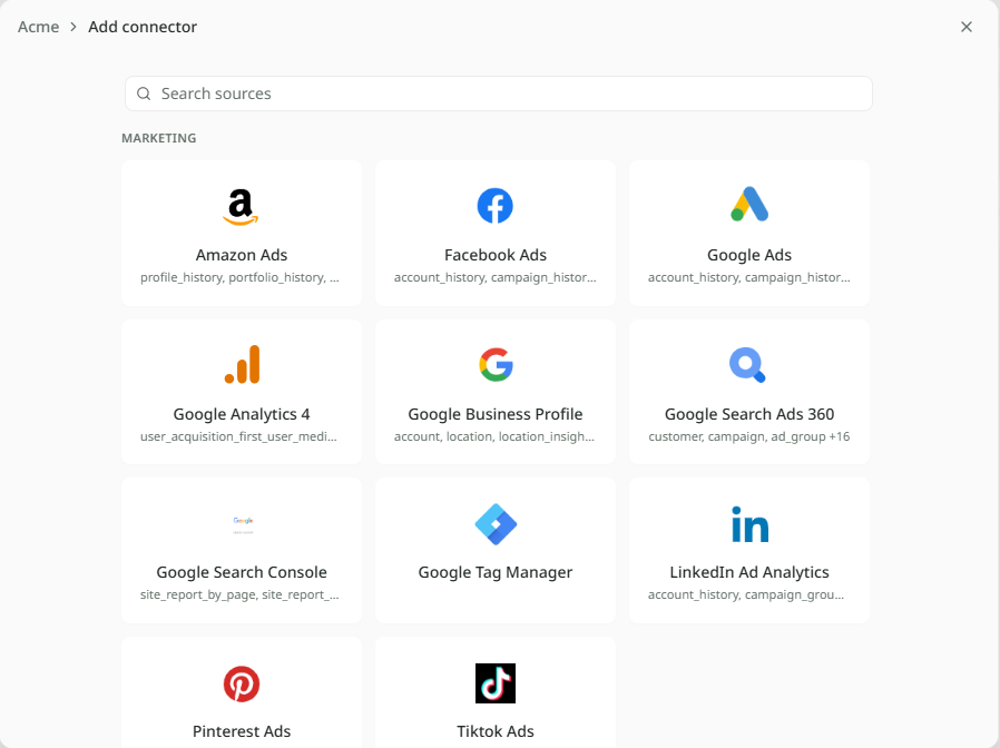 The Add data window on the Connect a source step: a Search sources box at the top and a grid of system tiles with their logos beneath it, HubSpot among them with the pointer over it, and a Request a connector link at the foot.